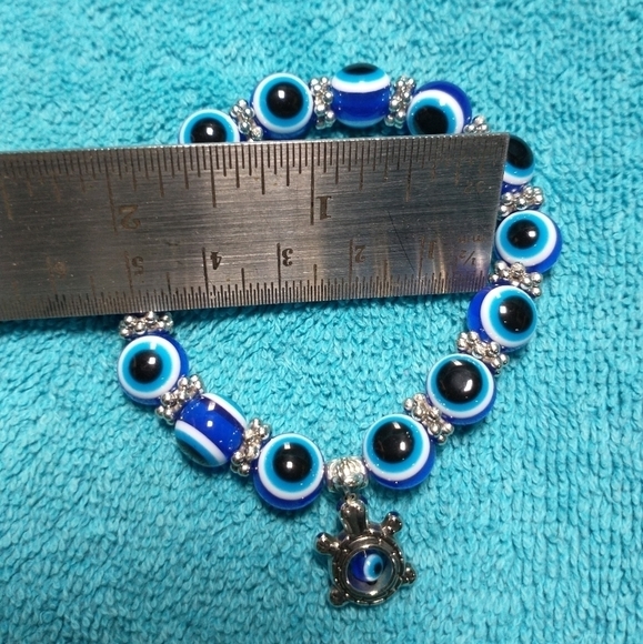 Silvertone turtle eye blue white black beaded stretch bracelet - Picture 3 of 3